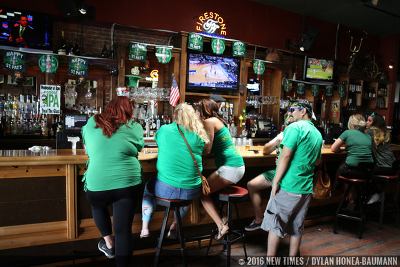 The Buffalo in downtown SLO serves green drinks to green shirts.