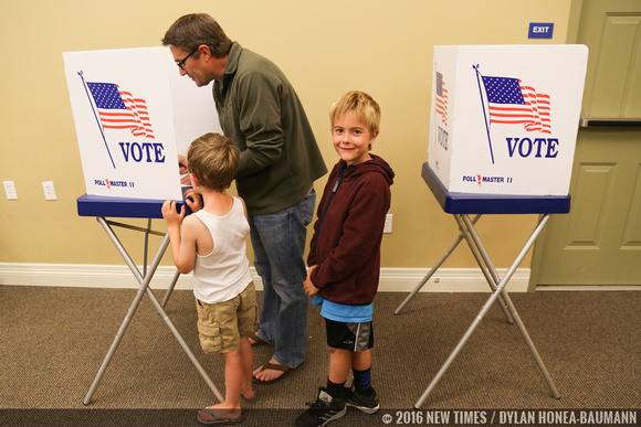 Engineer Derek Romer brought his kids with him to vote "so they'll know about this process" and how to be "responsible citizens."