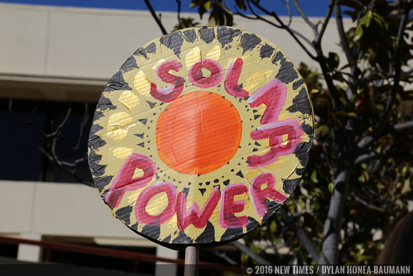 Some protesters pointed to solar power as an alternative to oil.