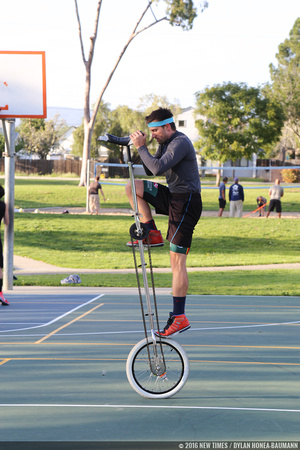 VonJon mounts a 7-foot tall unicycle at Meadow Park.